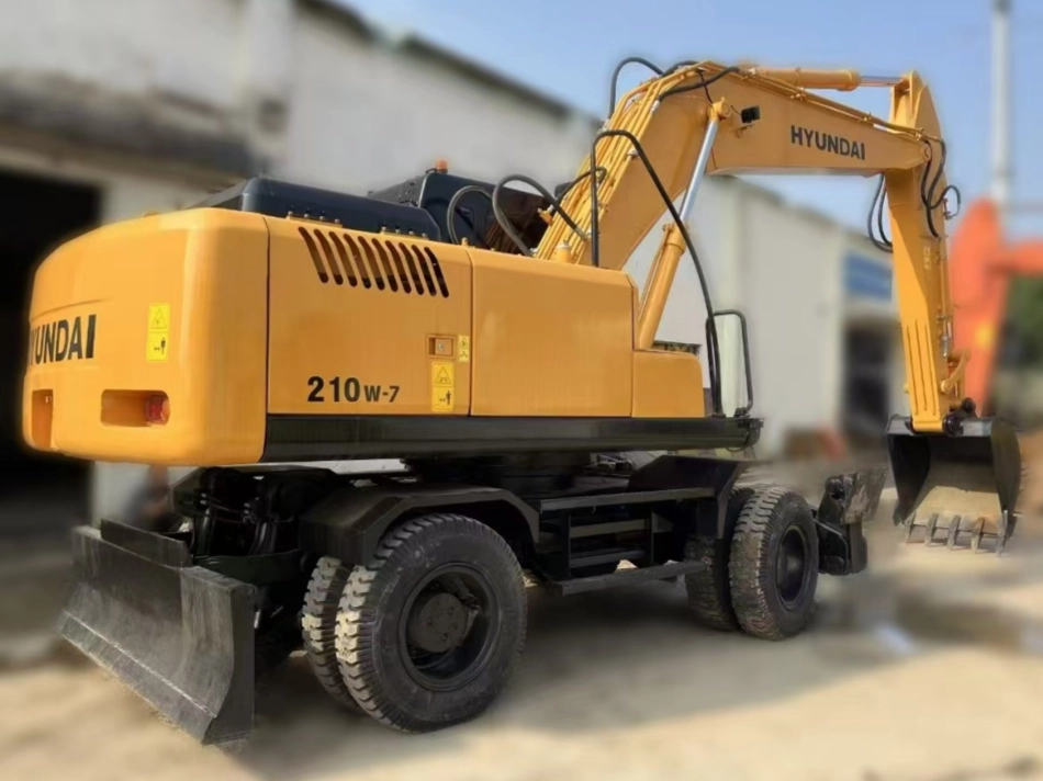 Excavadora de ruedas Hyundai R210-7W lado trasero derecho