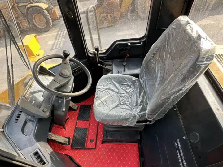 Cabina del cargador Komatsu WA380