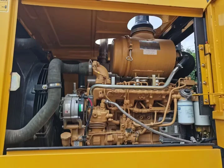 Motor de cargadora usado como referencia para revisar una retroexcavadora usada